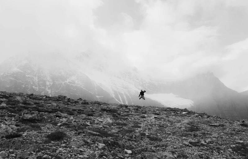 a man on skis going down a hill