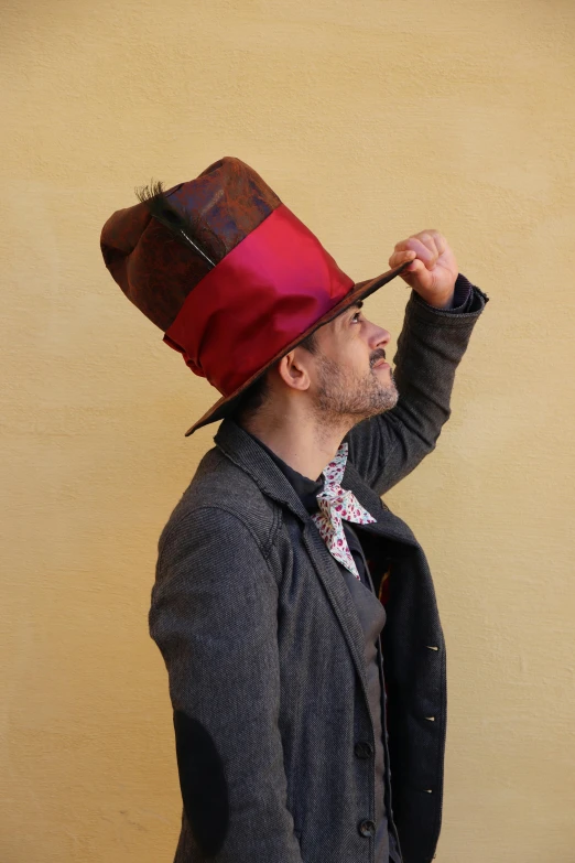 a man with a very colorful hat in his hair