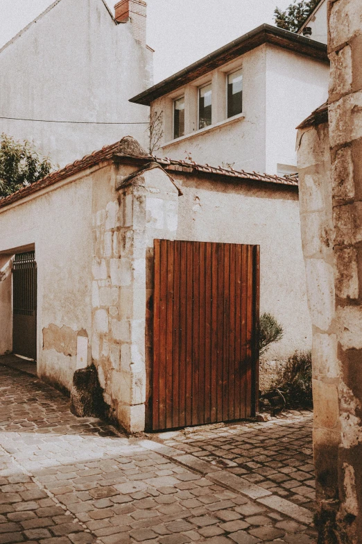 the po shows a old stone house in an older area