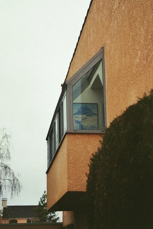 an image of a very tall yellow building