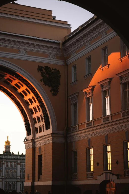 an archway is leading into a large building