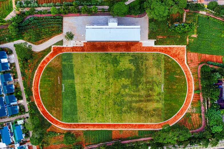 a large field with soccer goal in it