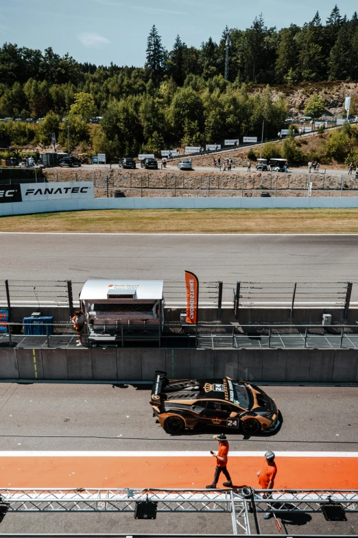 workers working at an airport loading luggage on top of their vehicles