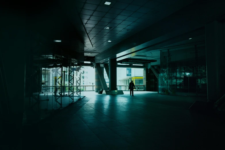 the view from a balcony looking towards a person in the dark