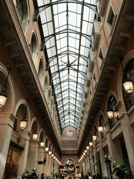 the lobby is lined with high ceilings and large windows