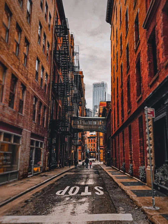 an alley in a city with lots of scaffolding