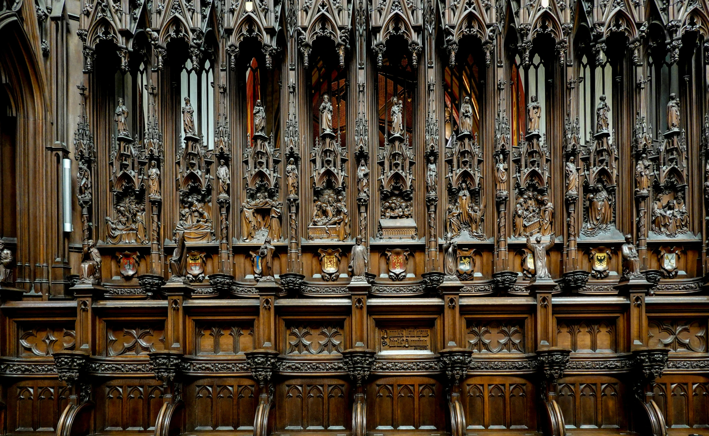 this is a very tall cathedral wall of wood