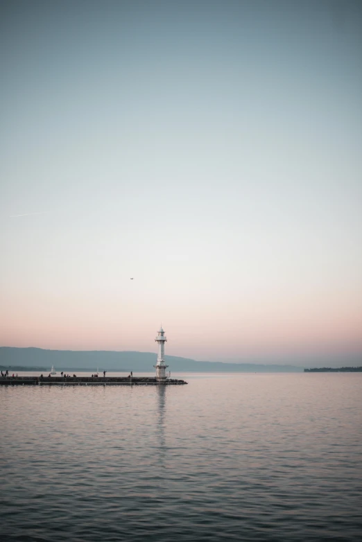 a sail boat sailing down a body of water