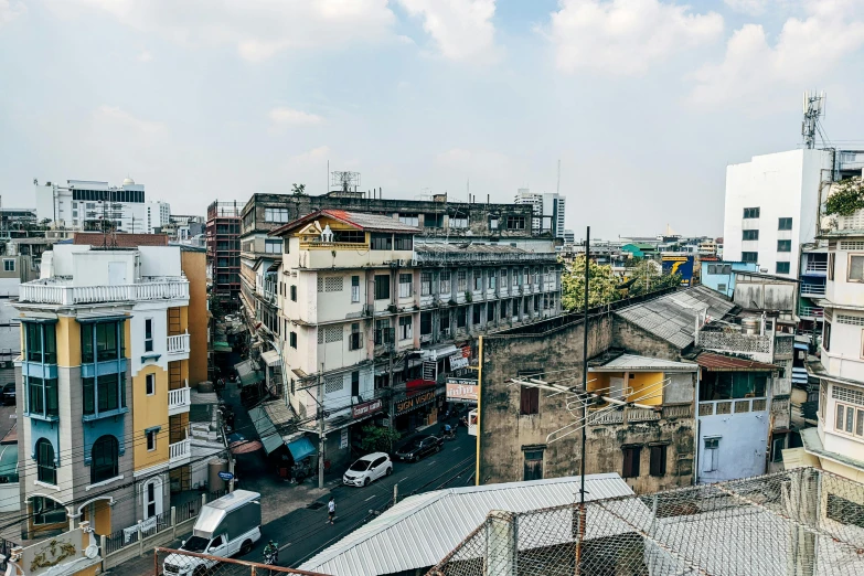 an over pass of urban slum below the clouds