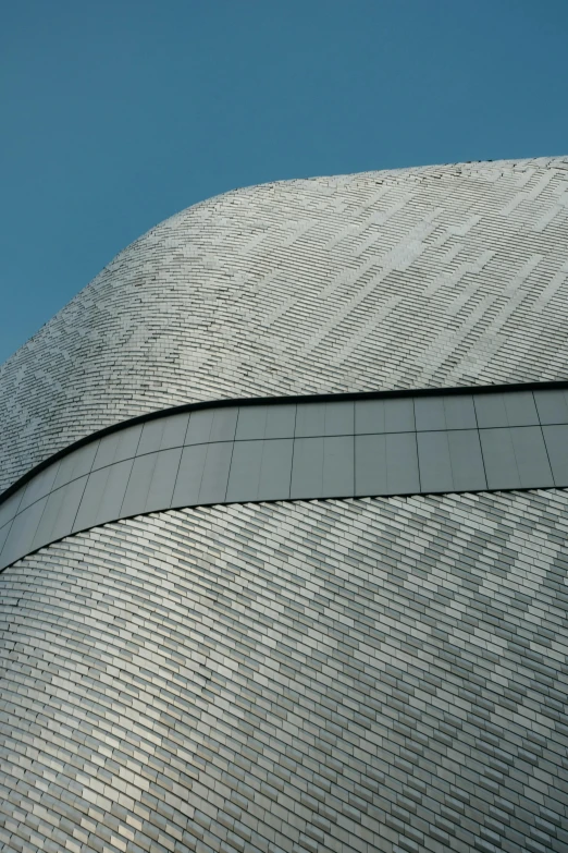 a large building with a massive circular roof