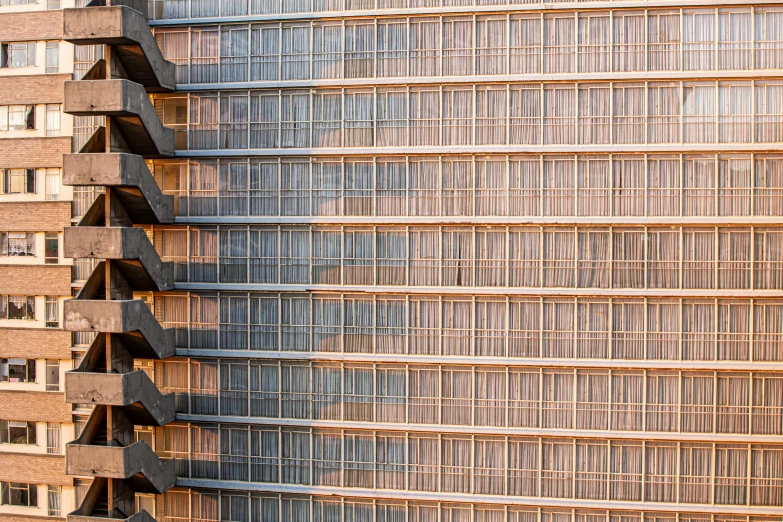 a building with a bunch of windows and lots of stairs