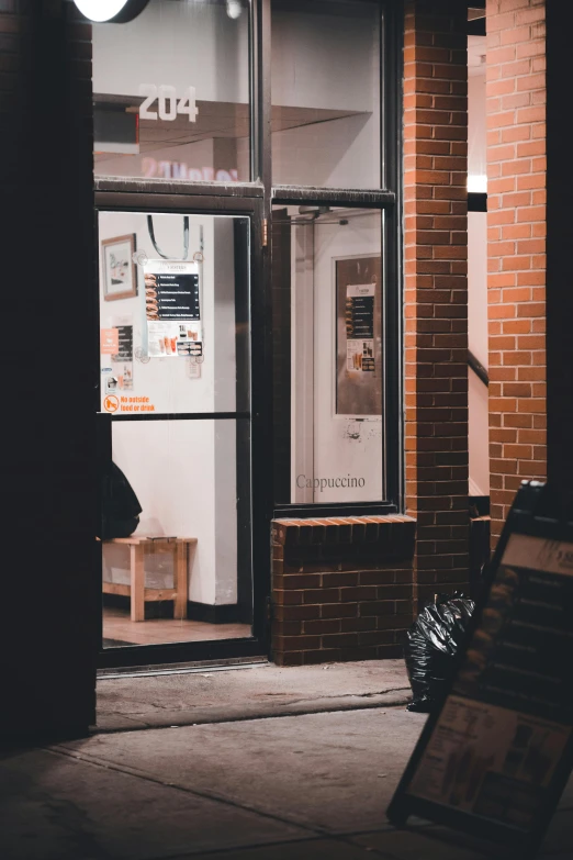 a door of a restaurant with the sign open