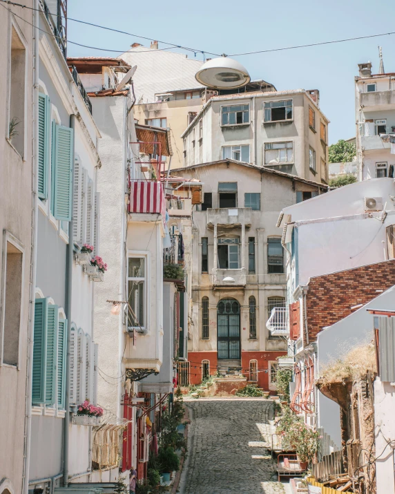 buildings on either side of a narrow stone street