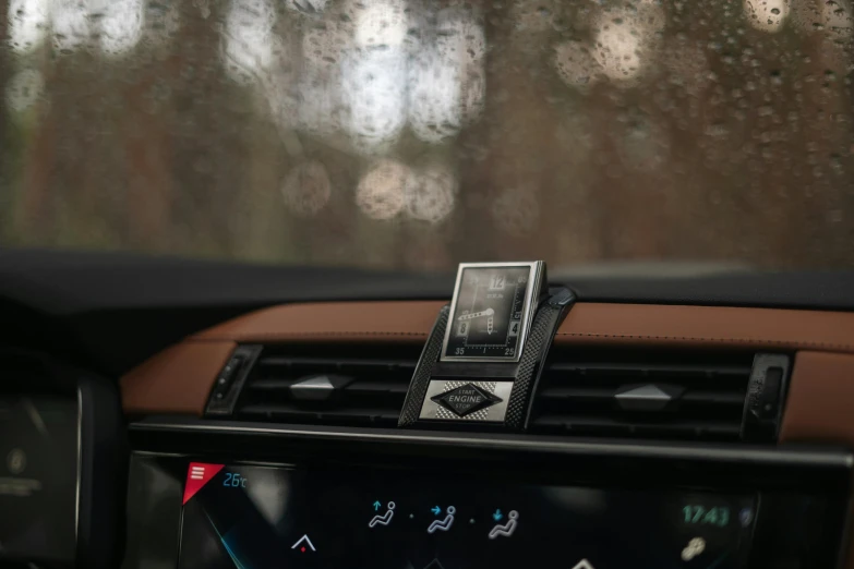 the interior of a car shows dashboard with an automatic start