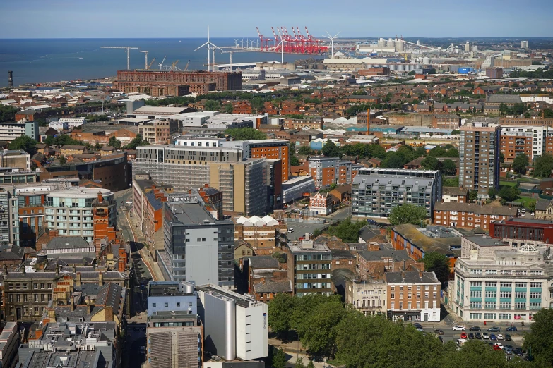 this view shows a city surrounded by tall buildings