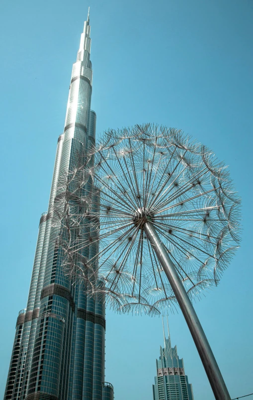 a large ferris wheel on top of a tall building