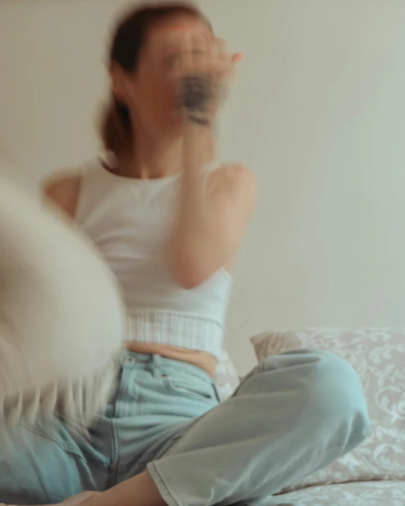 a blurry image of a woman talking on her phone