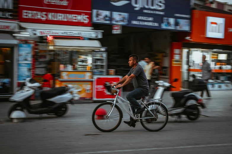 a person riding a bike in the street