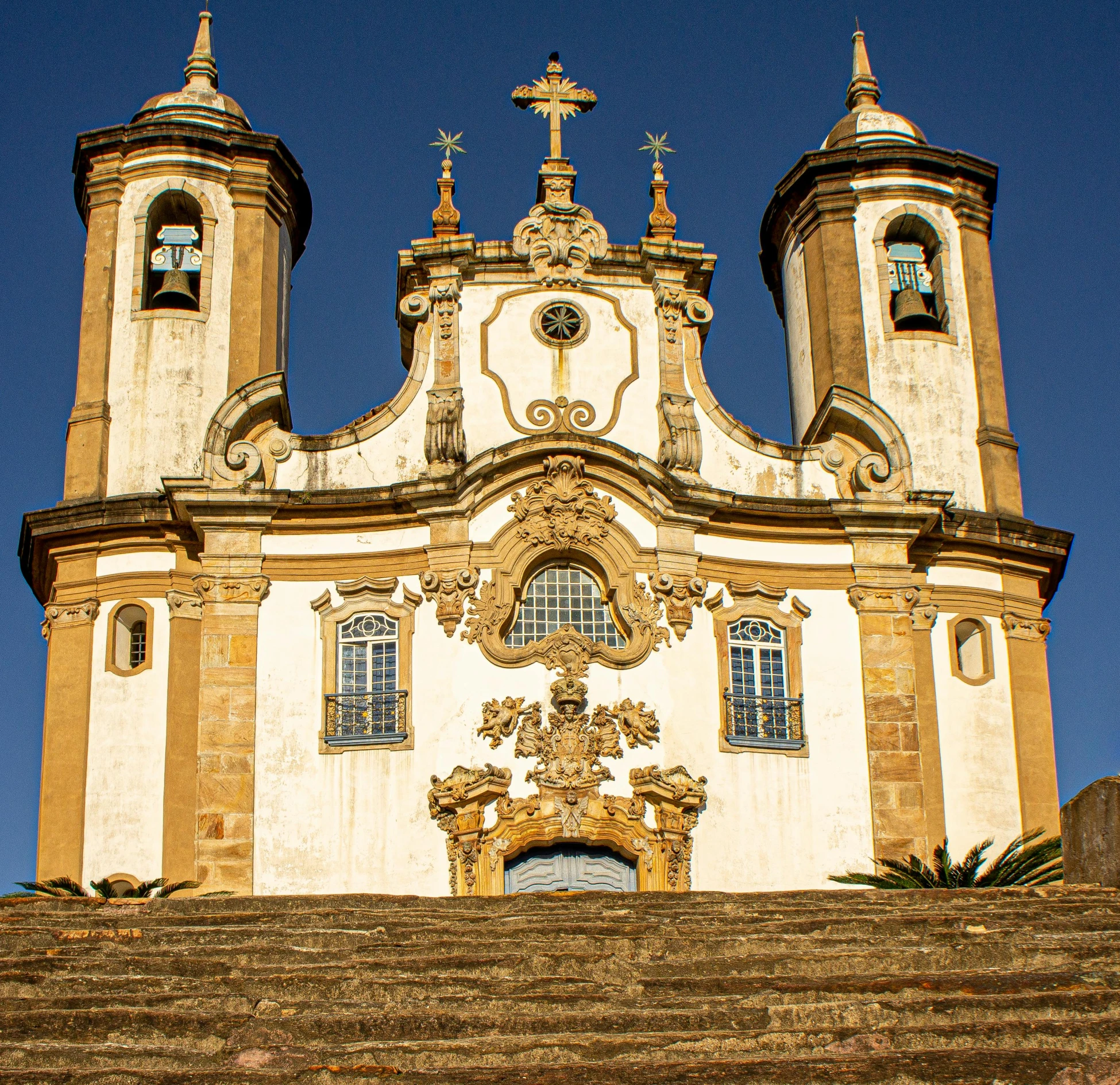 a very tall, ornate building with two towers