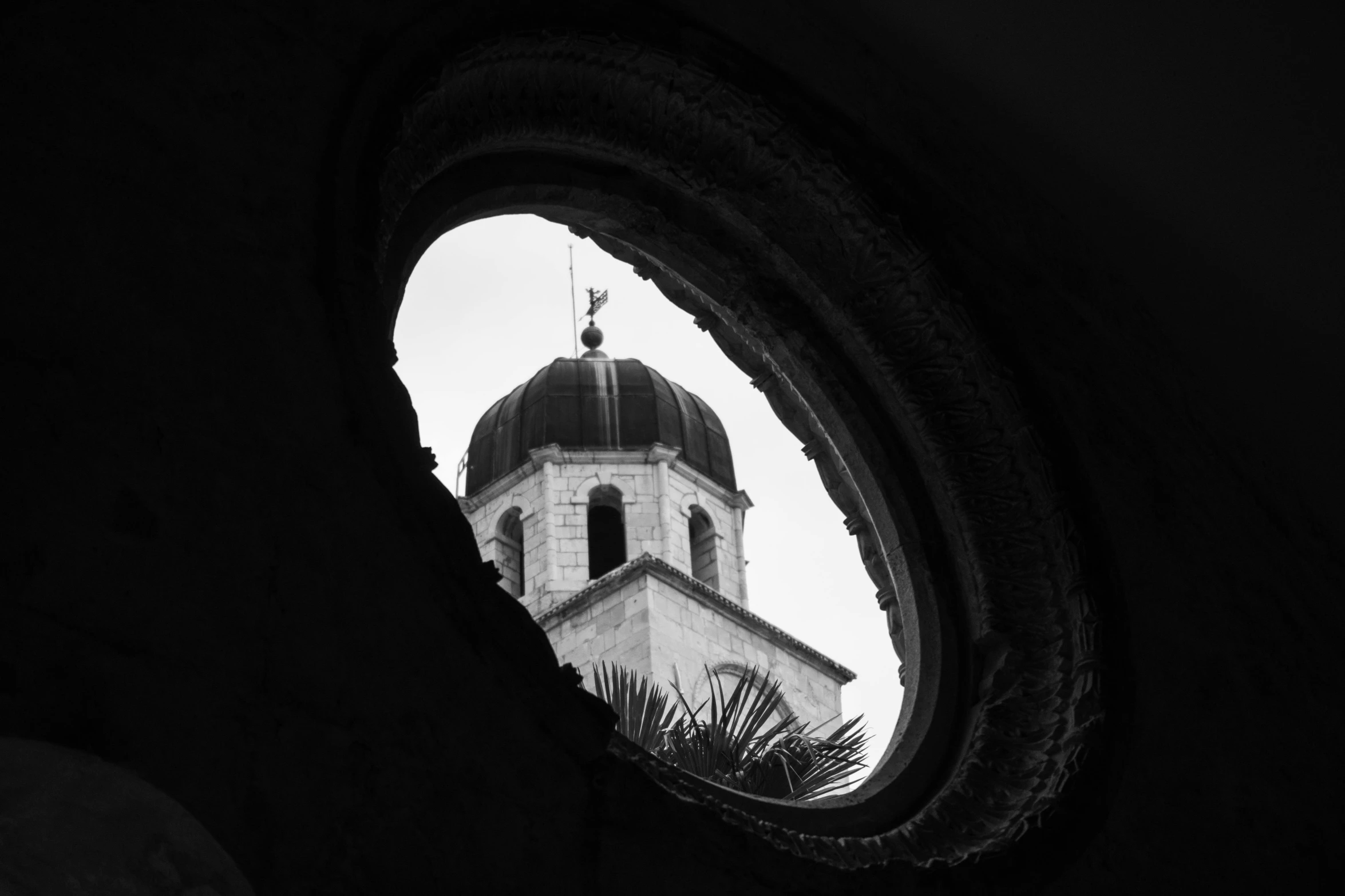 a very tall church steeple with a pointy roof