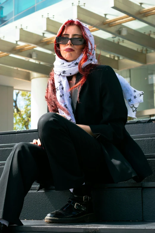 an image of a woman sitting on a stair way