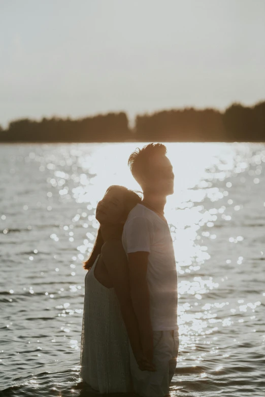 the couple are emcing in the water together