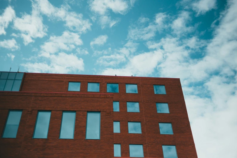 a close up of windows on a tall building