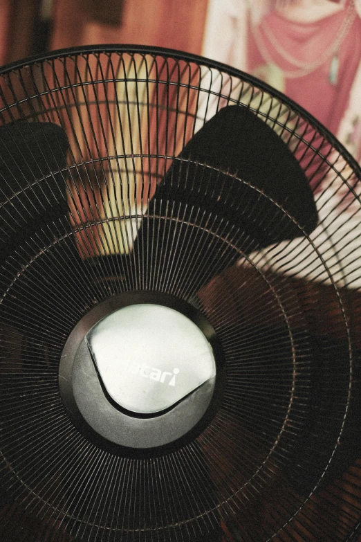 a computer fan that is sitting on top of a table