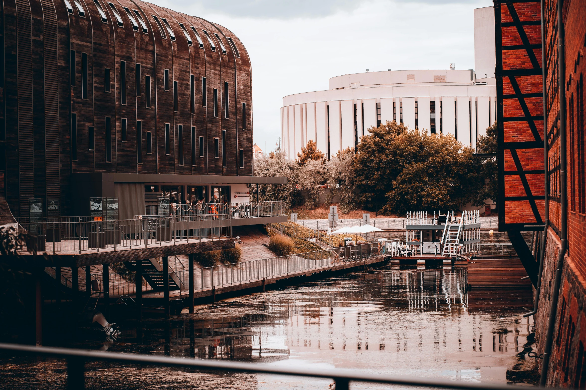 a waterway surrounded by tall buildings and water