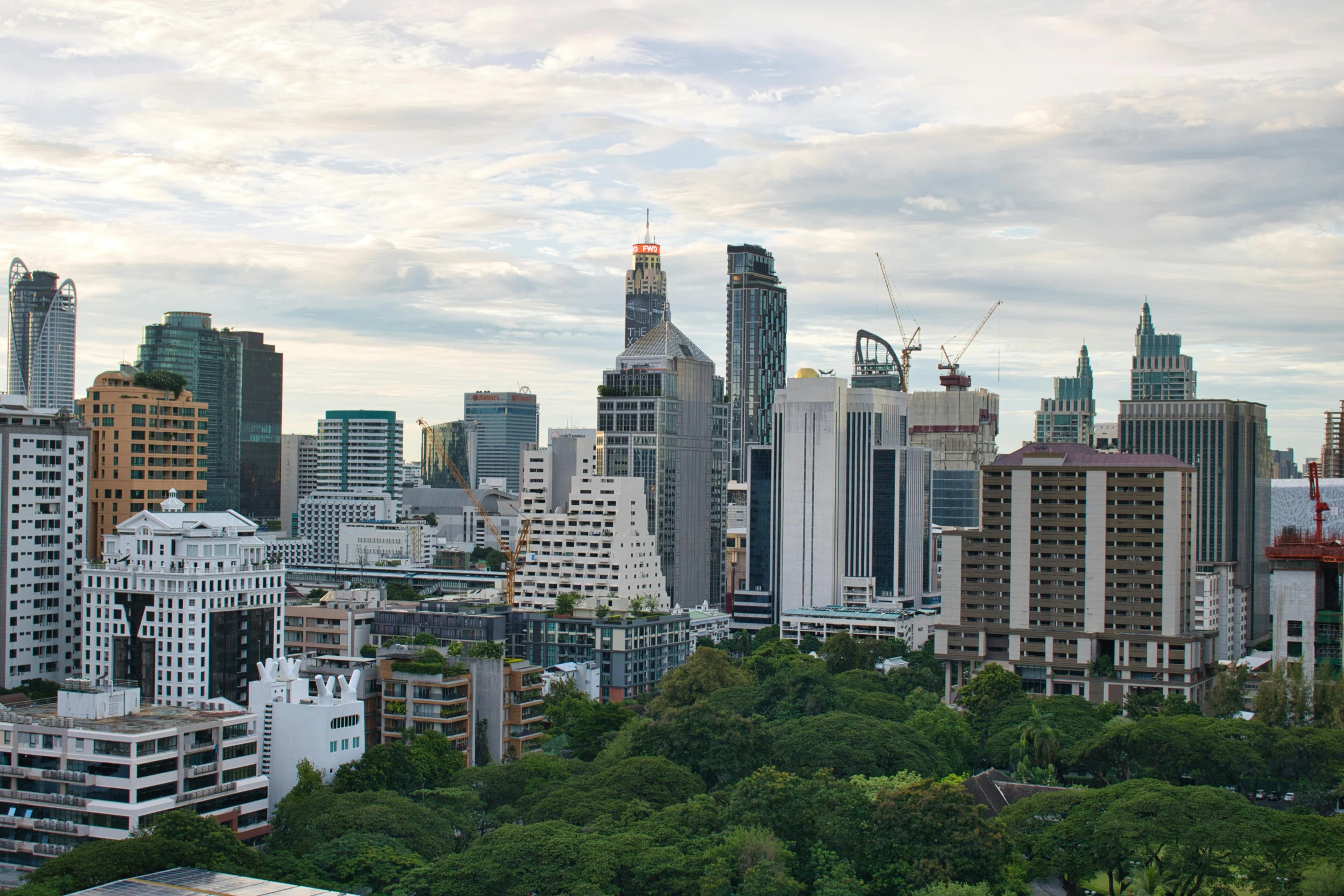 the city skyline with skyscrs and lots of tall buildings