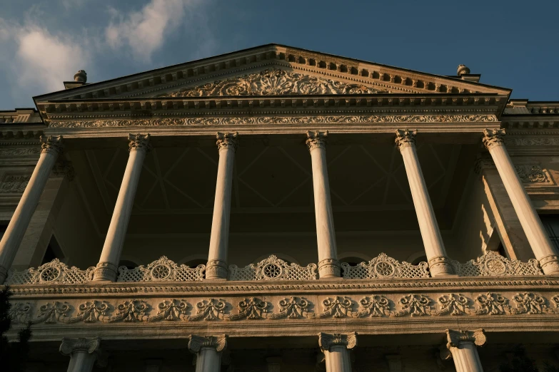 a large stone building with columns and arches