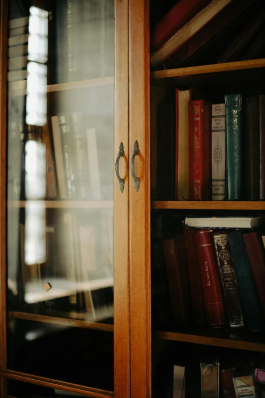 an open bookcase filled with lots of books