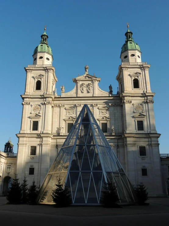 the large white church is adorned with an unusual geometric design