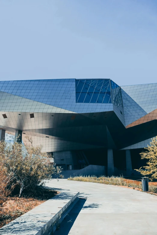 a large modern building with large triangular windows