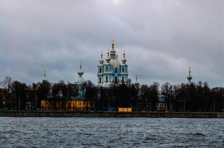 an image of a building on top of the water