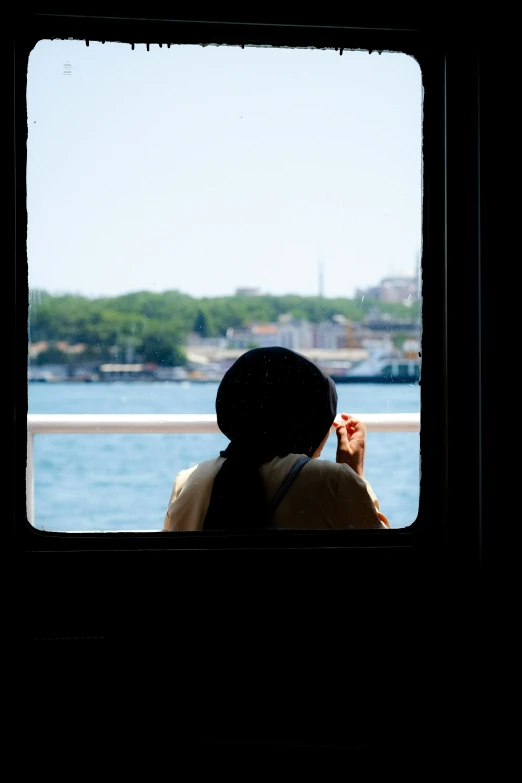 the view from inside the passenger window, from across the water