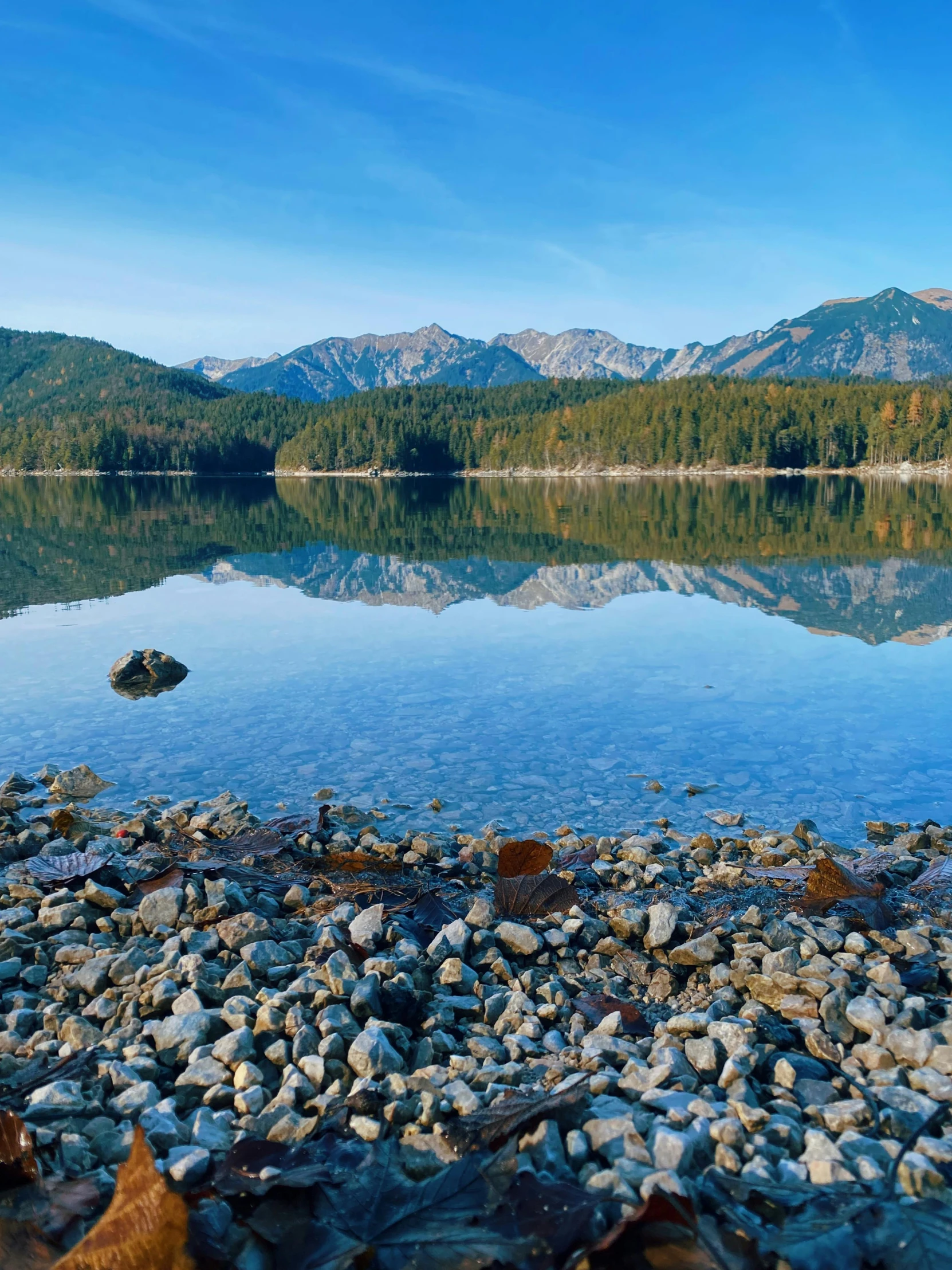 a large body of water sitting between two mountains