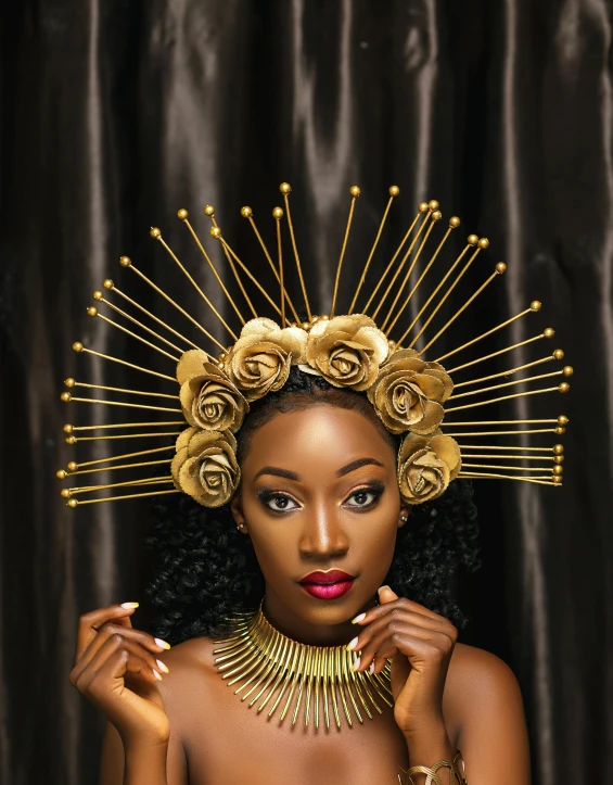 an african woman wearing an elaborate headpiece