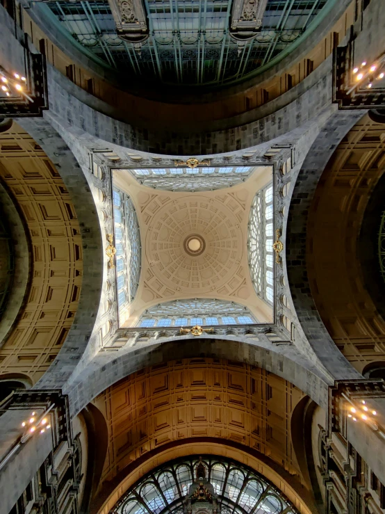 a ceiling filled with lots of windows and large windows