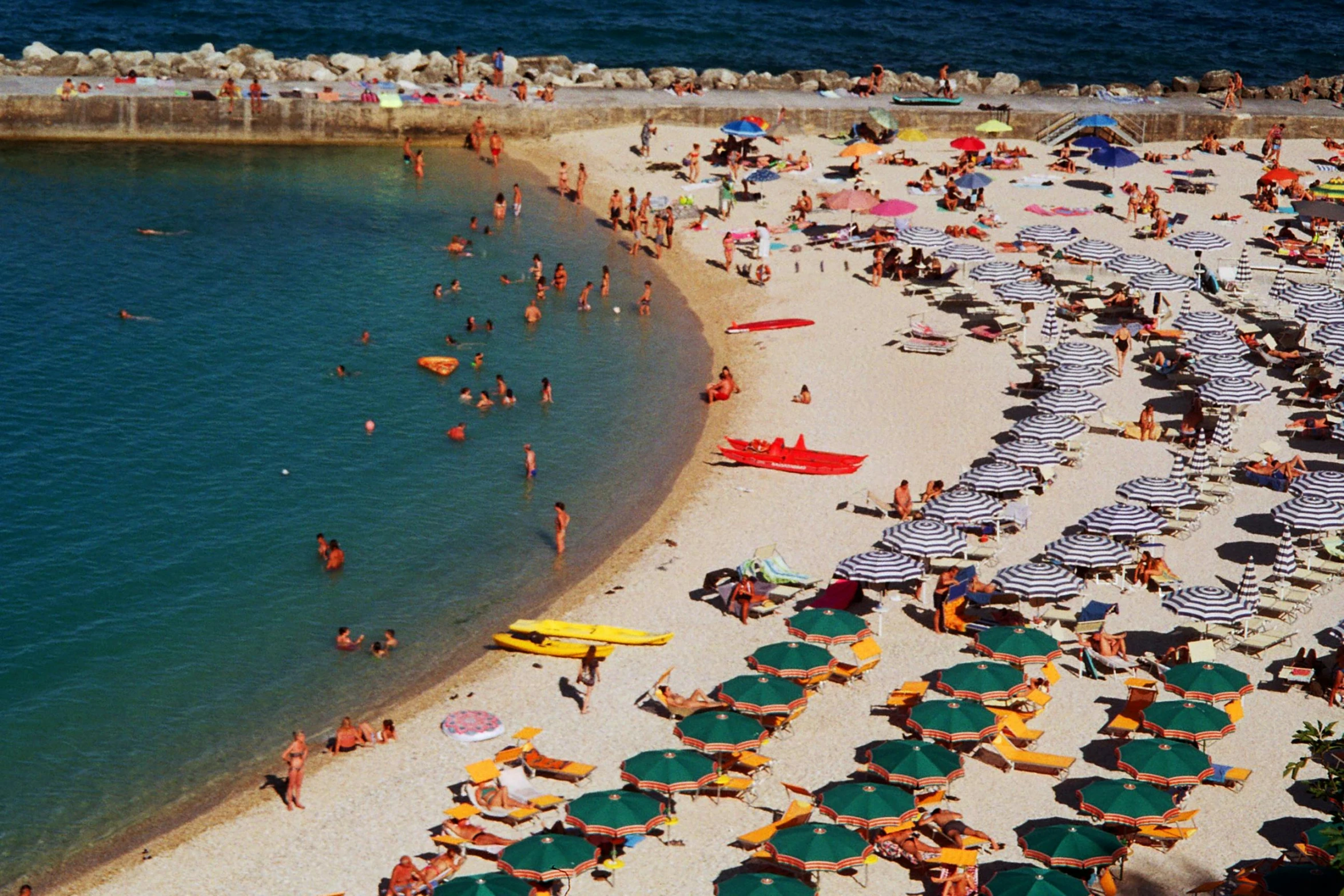 people enjoy the beach in a nice day