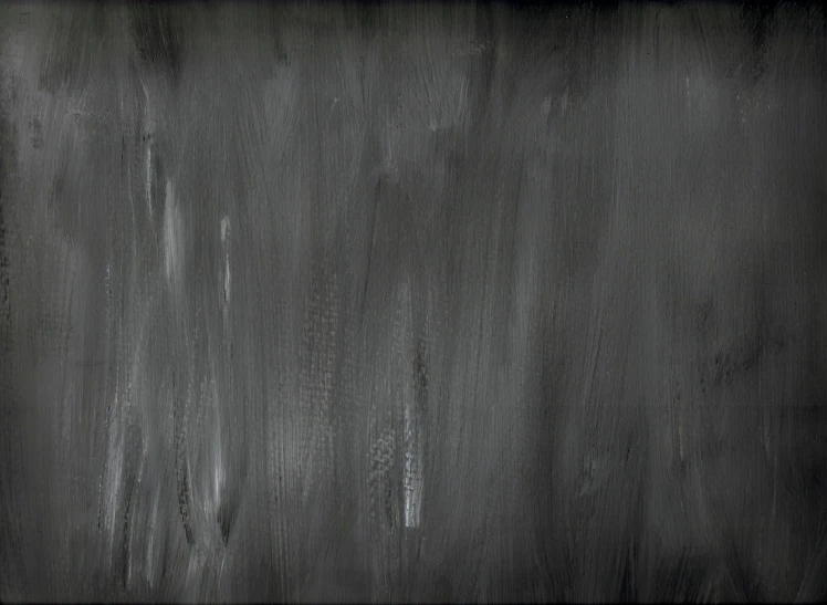 a black and white po of grungy paint on a wall