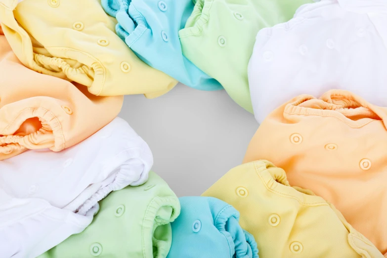 the baby cloth diapers are all different colors