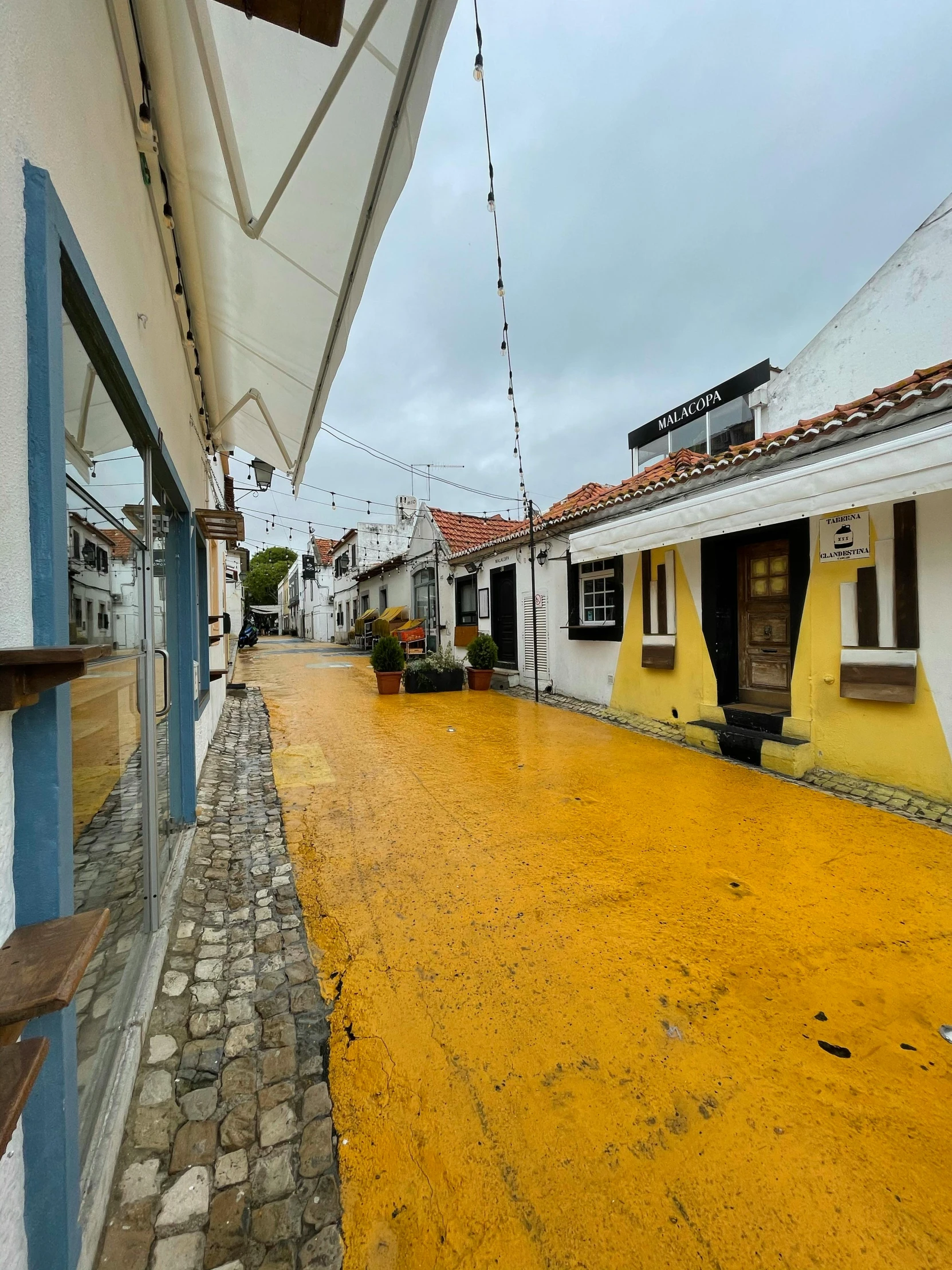 the street is full of colorful painted houses