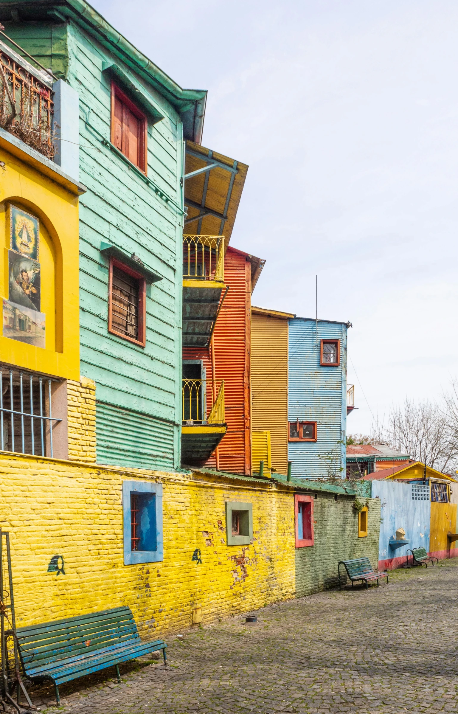 there is a colorful city block with many buildings