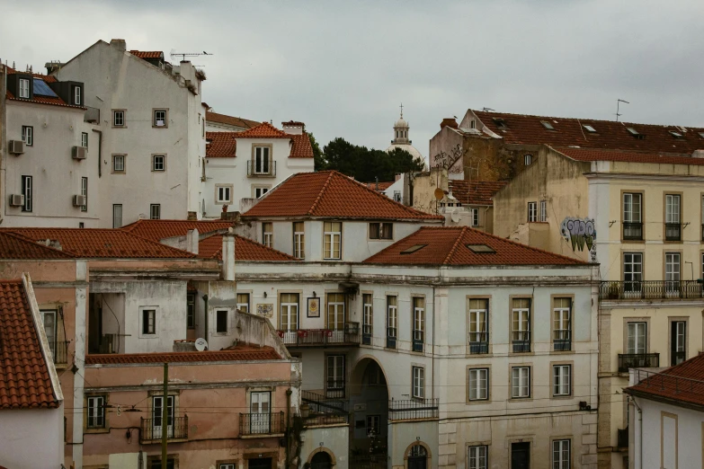 a view of some buildings from the rooftop