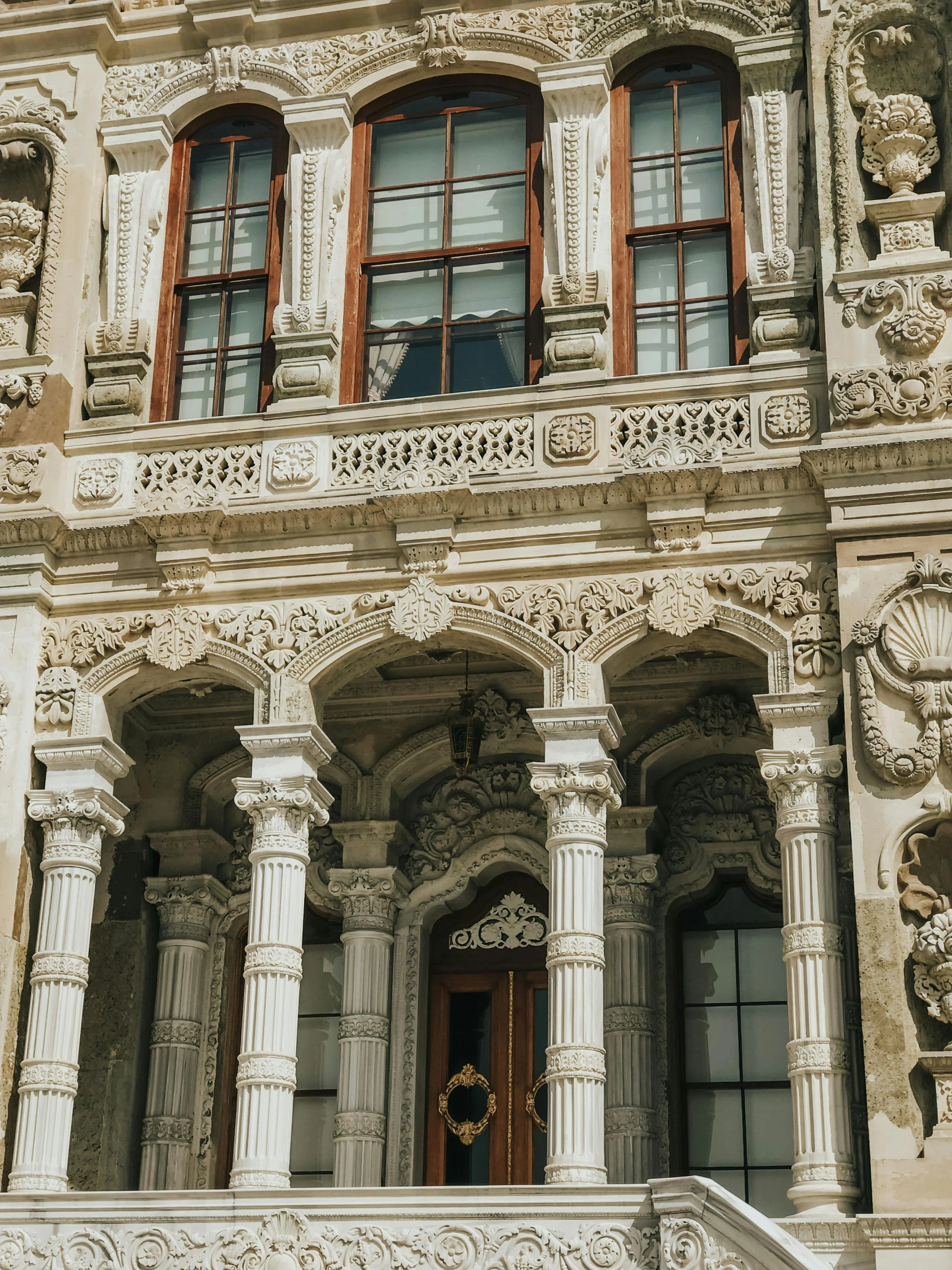 there is an ornate stone building with windows