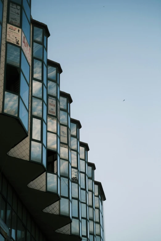 a view of some very tall windows from below