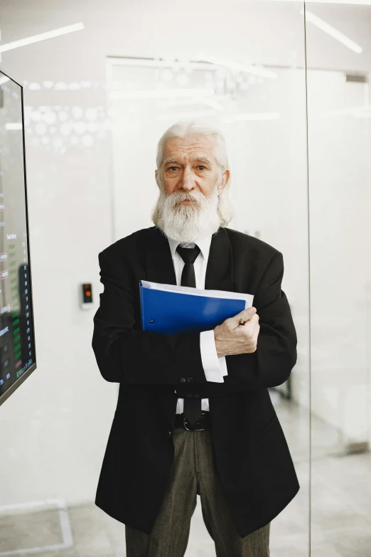 an older man is standing in the glass