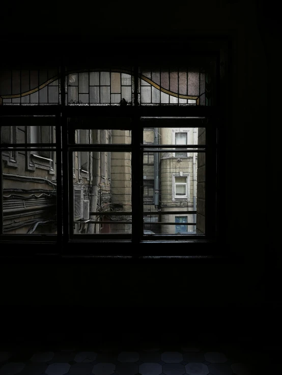 view from inside an open window of an old building