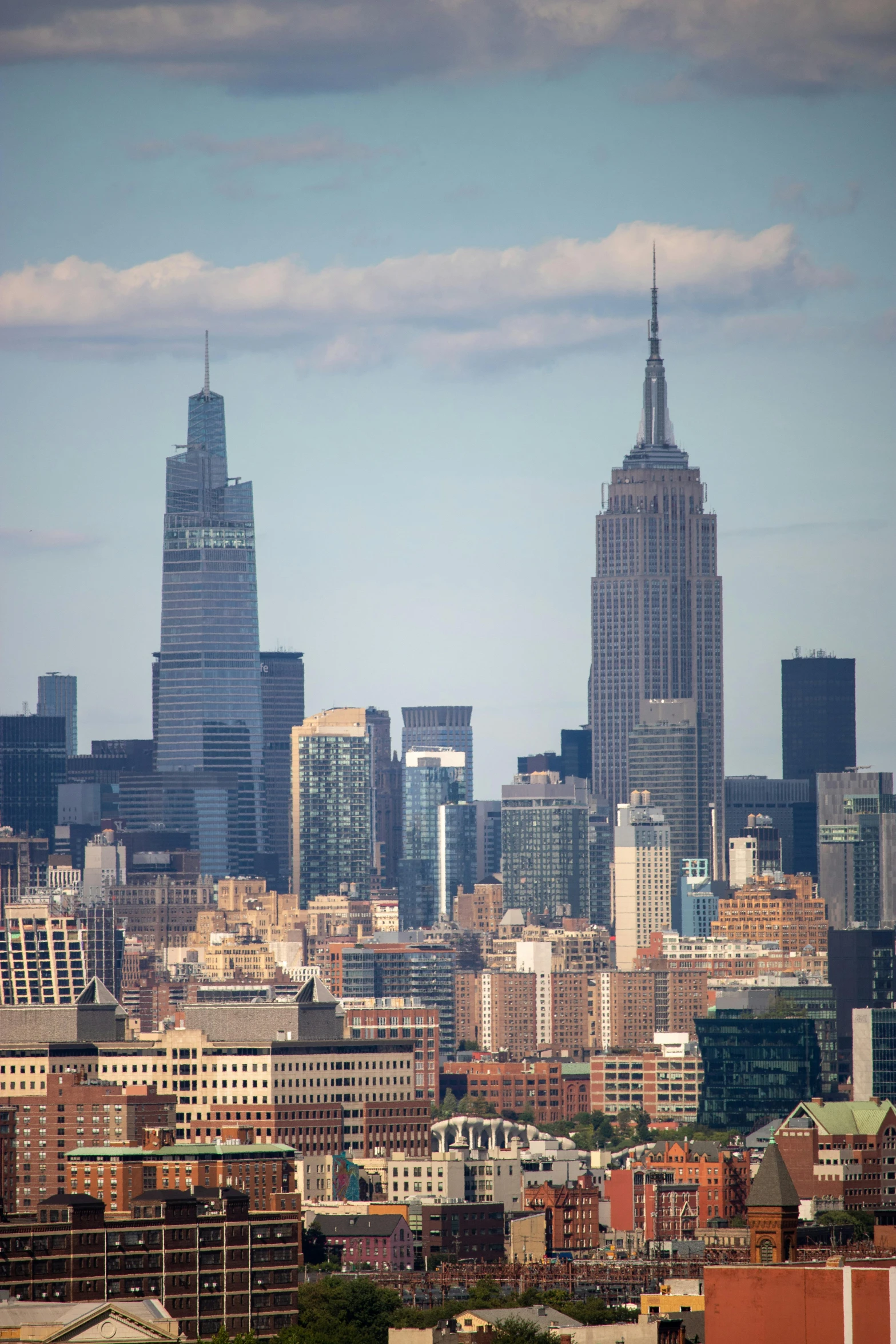 the city skyline and skyscrs are all facing in different directions